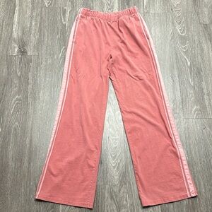 Pink sweatpants with strips on the side